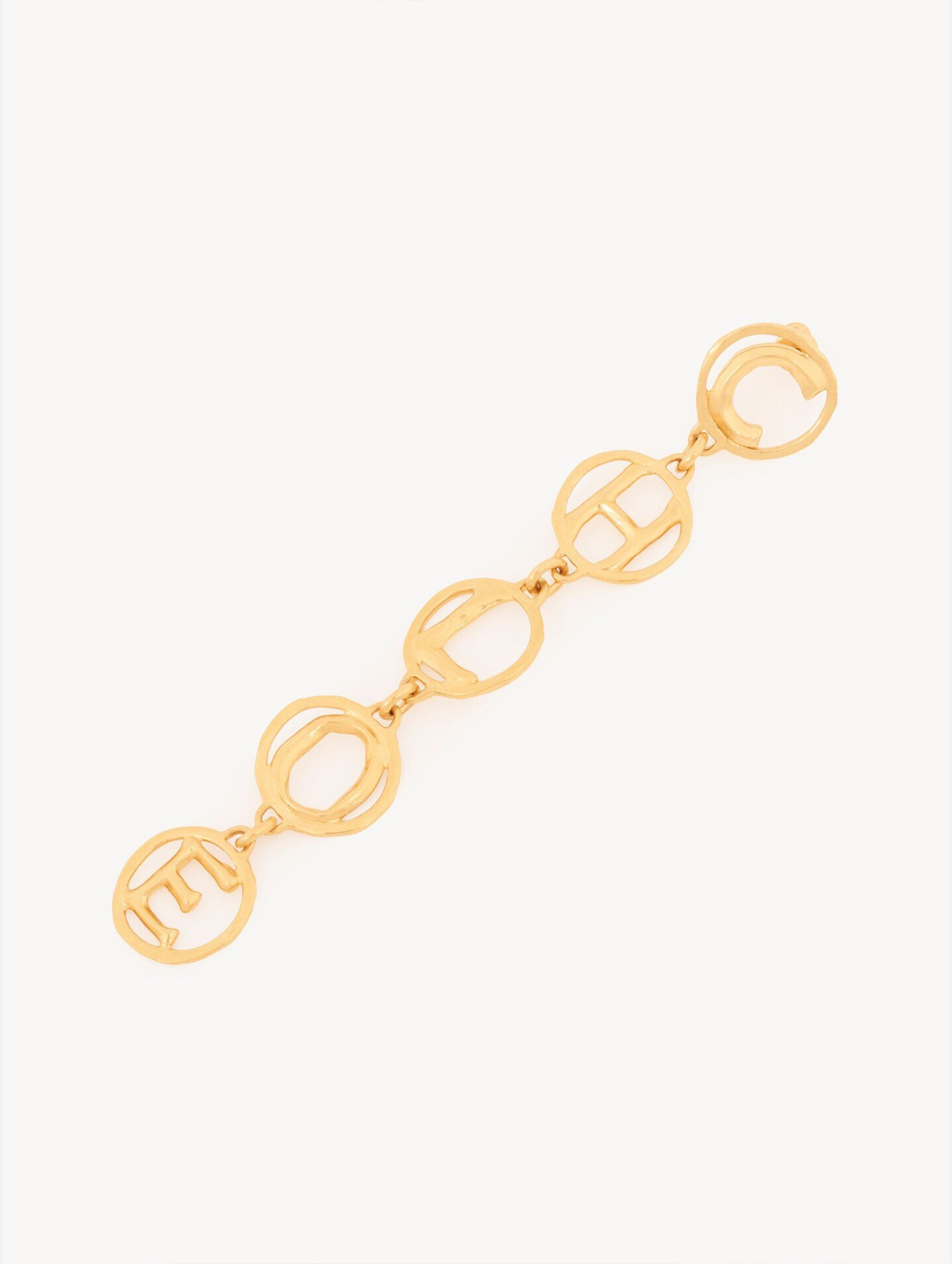 The Chloé Script Earrings in Vintage Gold