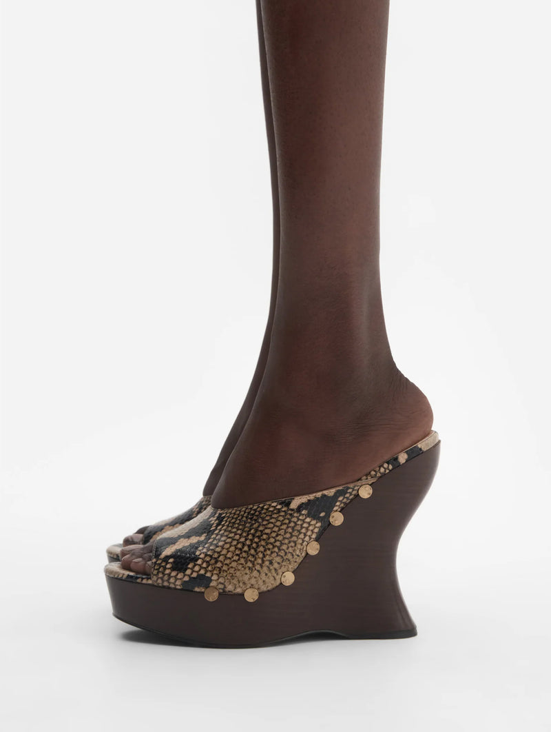 Snake-embossed Wedge Mules in Brown
